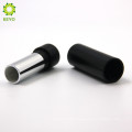 empty cosmetic container round black metal aluminium lipstick tube